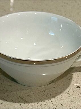 White Porcelain teacup with Gold Rim